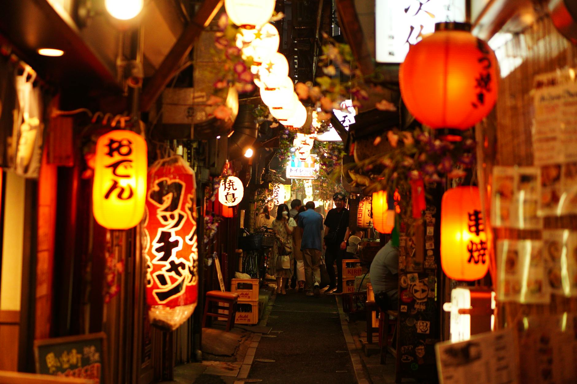Golden Gai narrow alley at night with lanterns Shinjuku