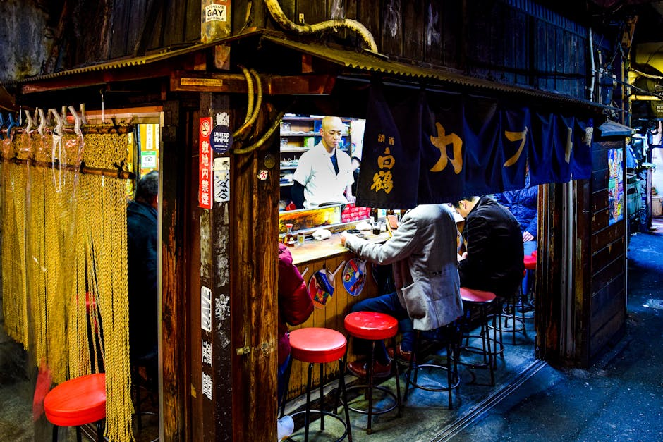 Traditional izakaya yokocho alley in Tokyo with lanterns