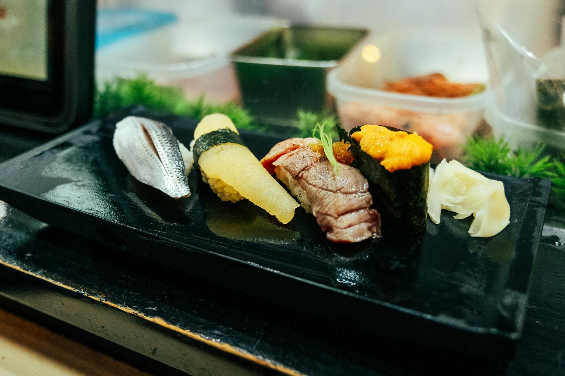 Traditional Japanese sushi platter beautifully arranged at a Tokyo restaurant - tokyo food guide
