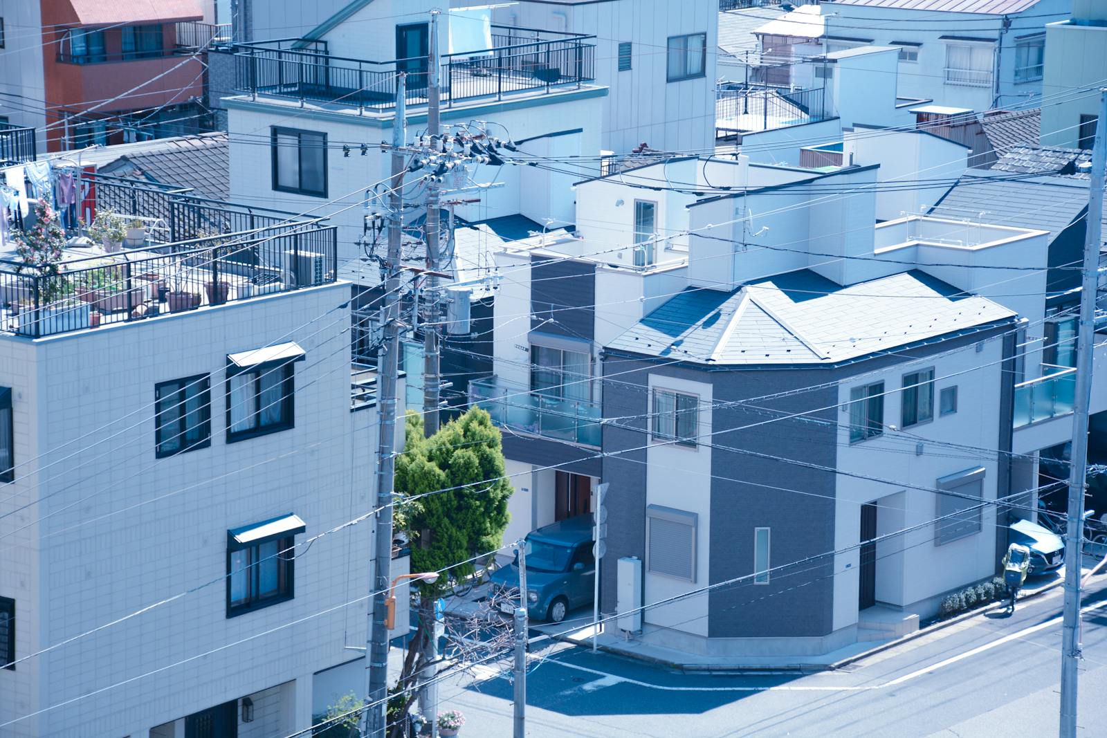 Traditional residential rooftops in a quiet Tokyo neighborhood showing local everyday life