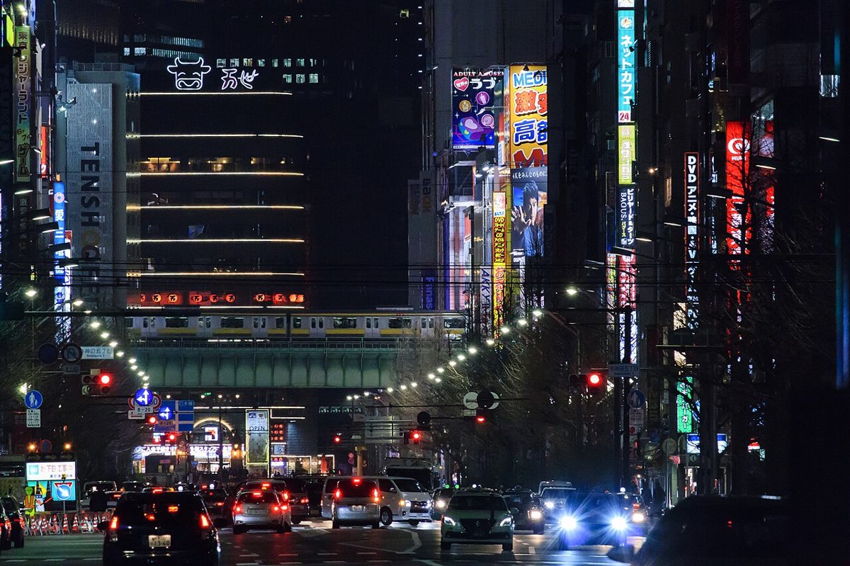 Akihabara streets glowing with neon at night