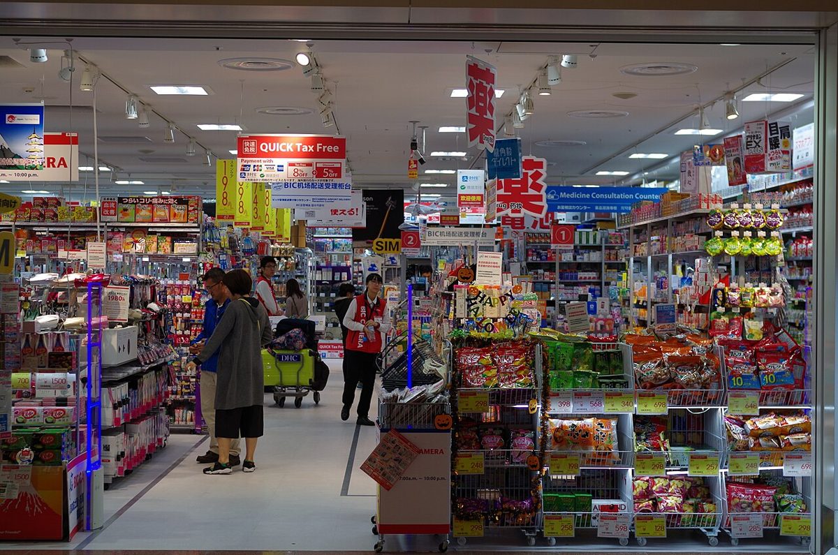 Interior of a BIC Camera electronics store in Tokyo with a visible Quick Tax Free sign