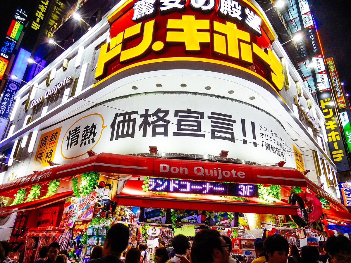 A Don Quijote storefront in Tokyo with the chain's bright yellow signage