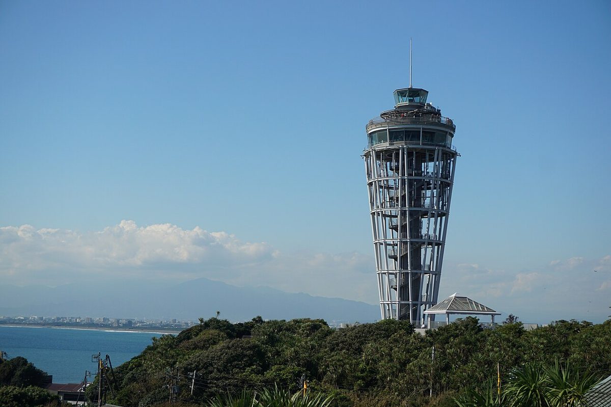 The Enoshima Sea Candle observation tower rising above Samuel Cocking Garden