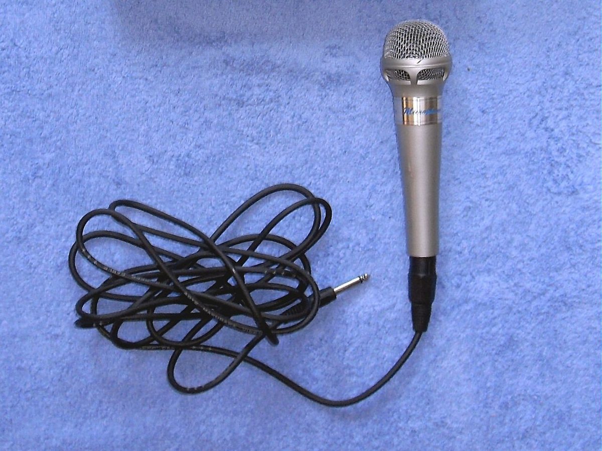 Microphones and a song-selection tablet inside a Tokyo karaoke room