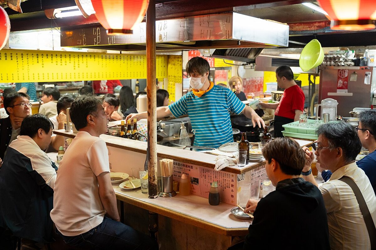 Tiny lantern-lit eateries in Omoide Yokocho alley near Shinjuku Station