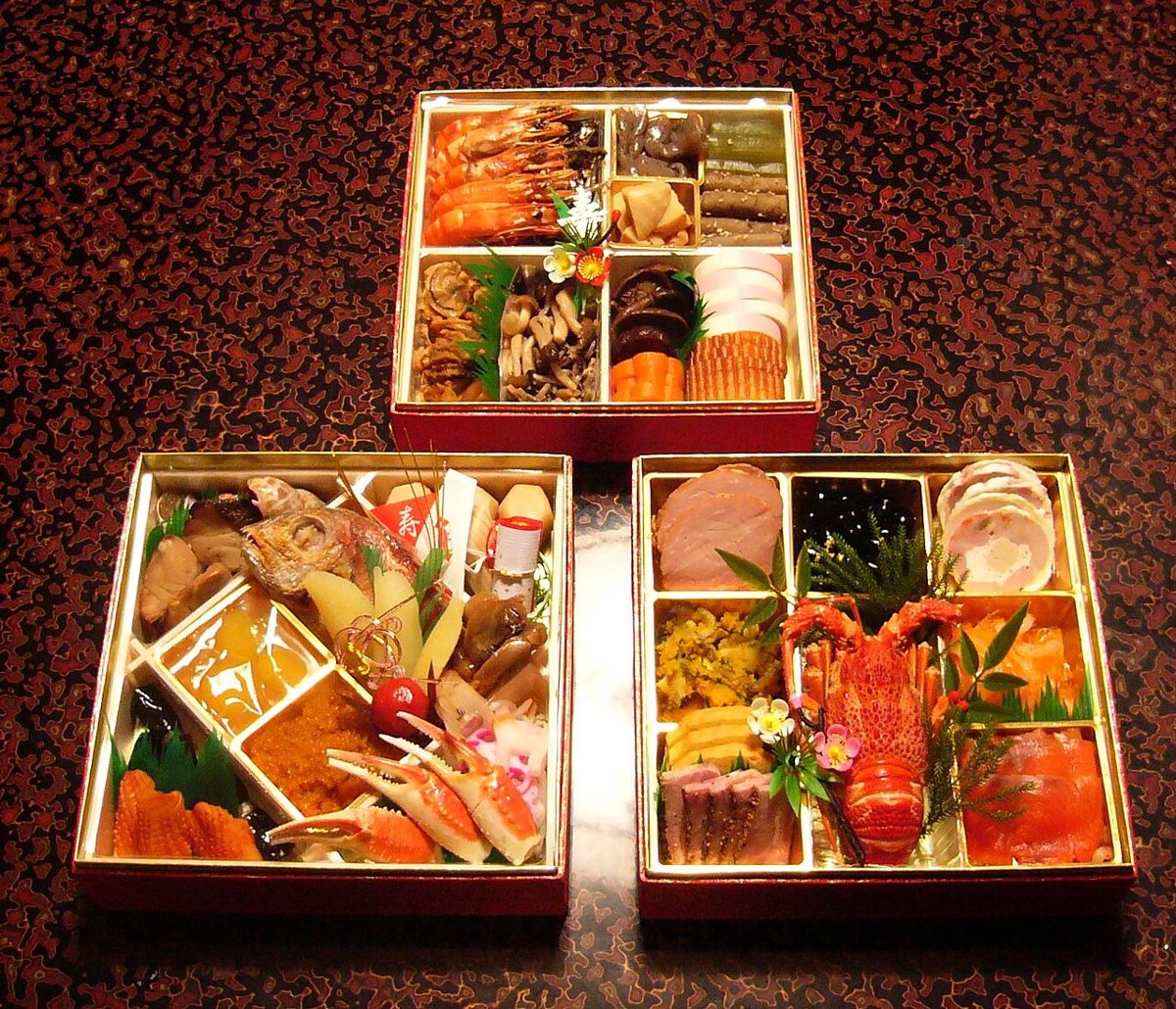 A tiered lacquer box of colourful osechi ryori New Year dishes