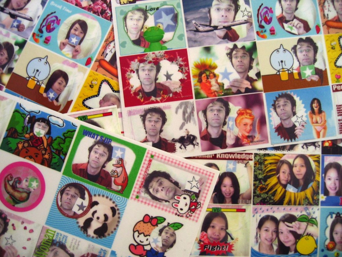 Brightly decorated purikura photo sticker booths in a Japanese arcade