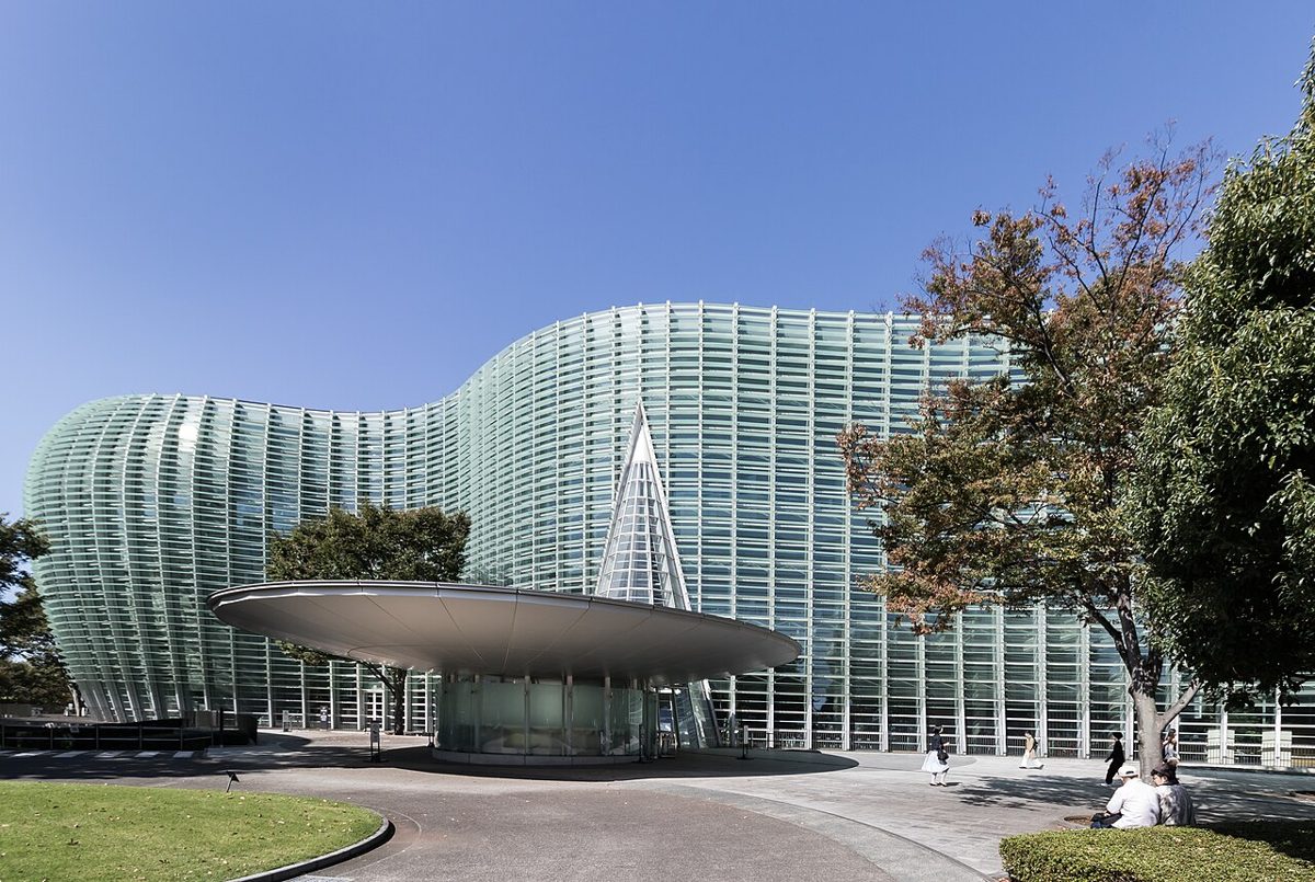 The wave-like glass facade of The National Art Center, Tokyo in Roppongi