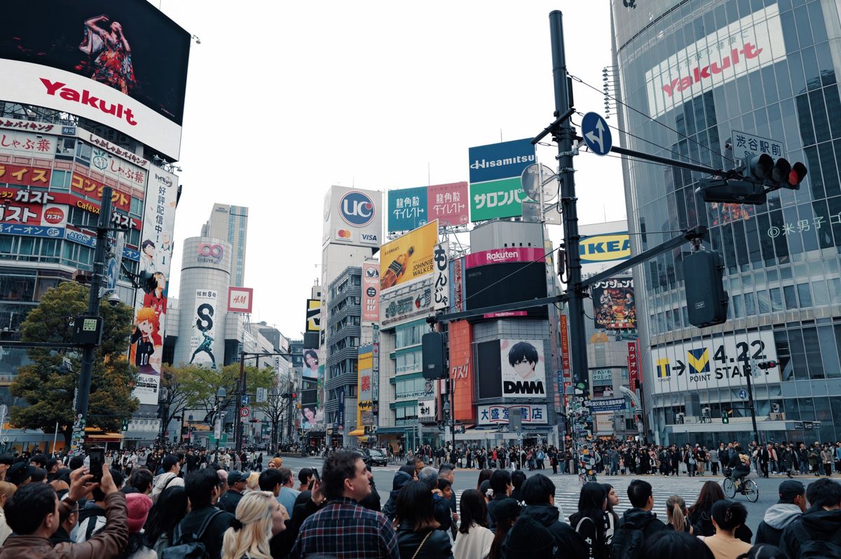 The Shibuya scramble crossing busy in daylight from street level