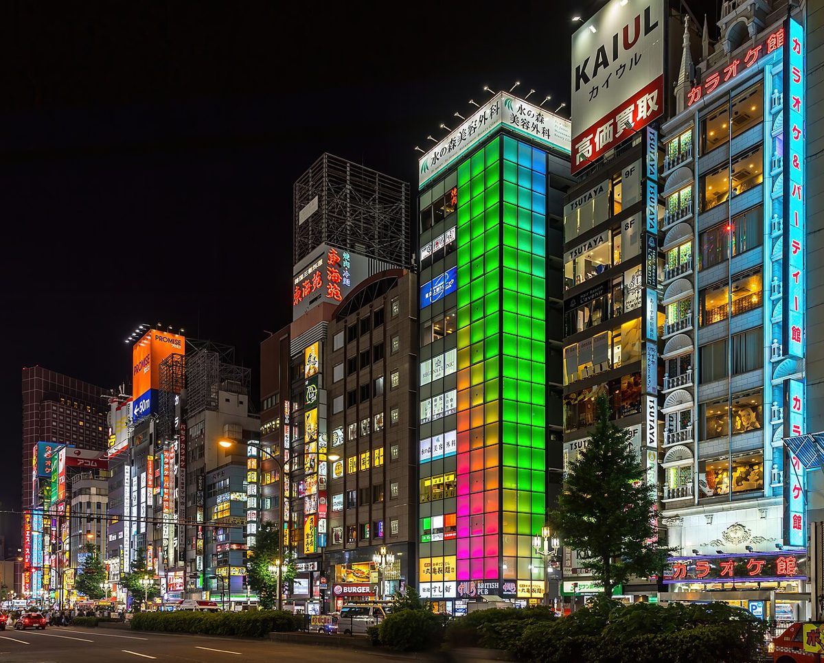 Neon signs and crowds in the Kabukicho entertainment district of Shinjuku at night