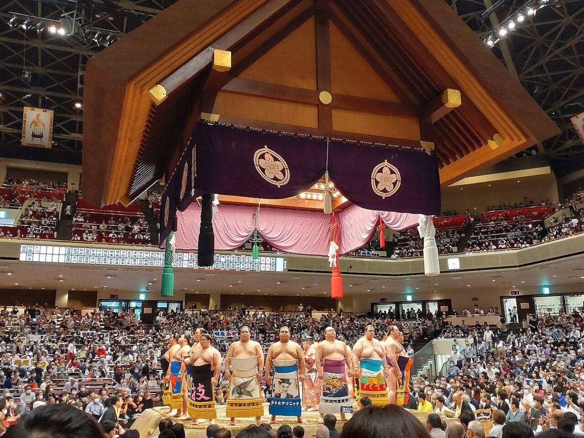 A sumo wrestler (rikishi) in traditional dress