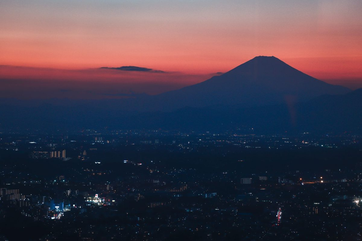 Tokyo at sunset with Mount Fuji on the horizon