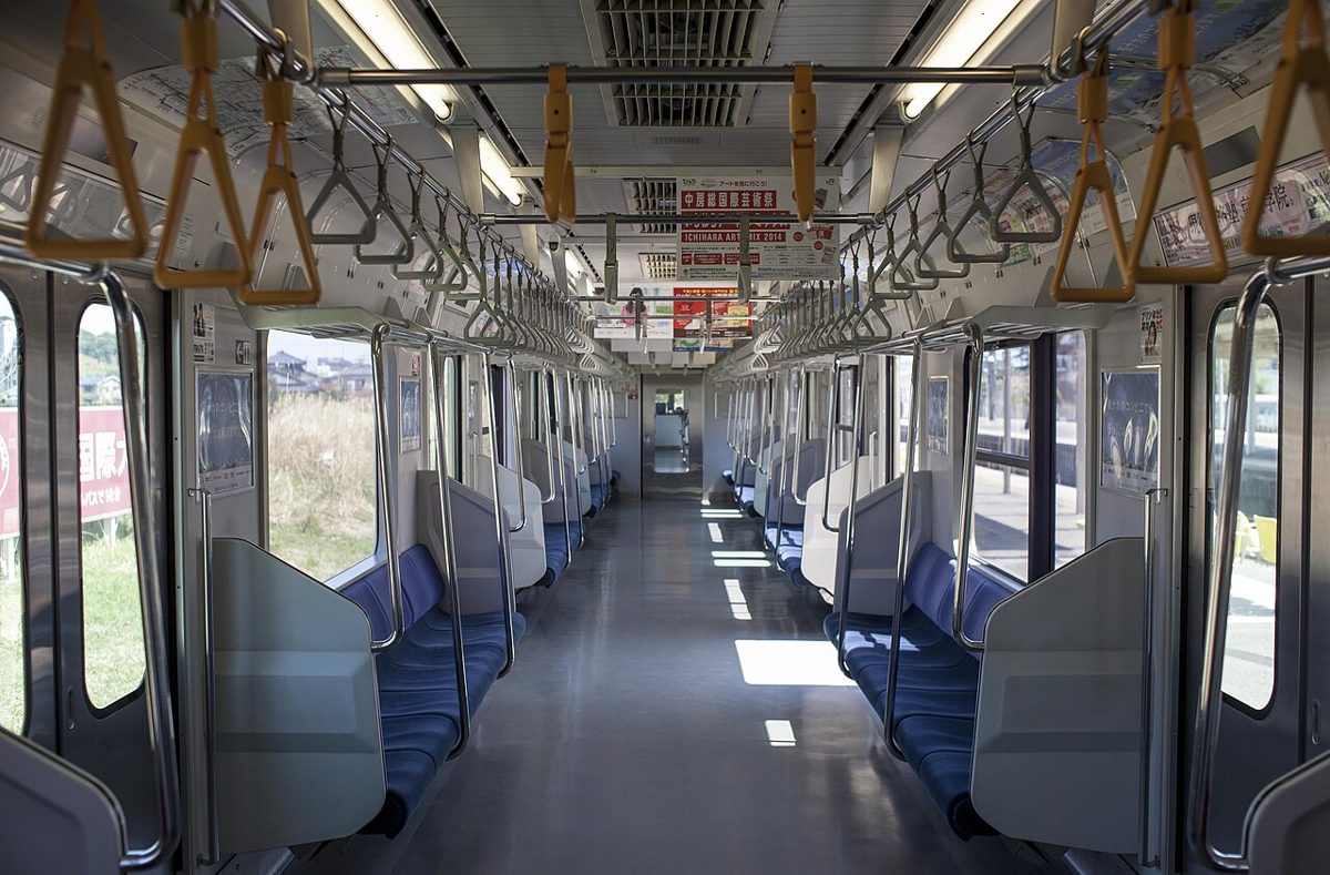 Passengers inside a Tokyo commuter train