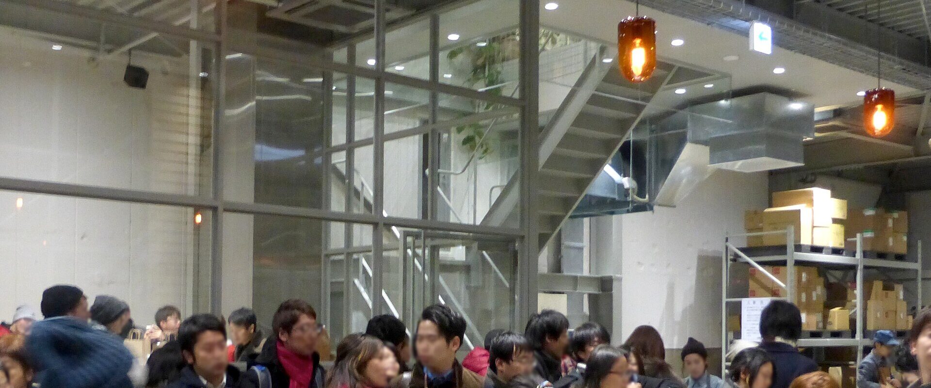 Crowds inside the warehouse-style Blue Bottle Coffee in Kiyosumi-Shirakawa on its opening day