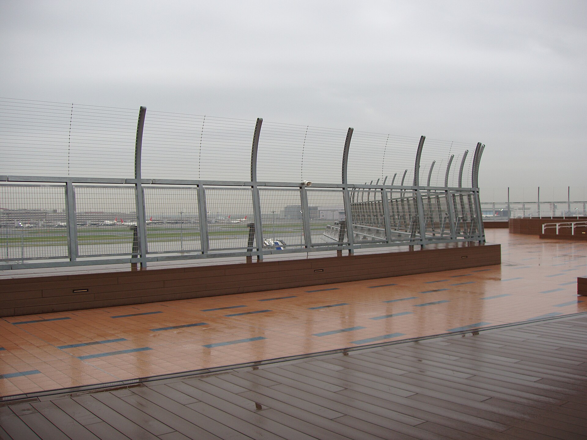 The open-air observation deck at Haneda Airport's international terminal looking out over the runways